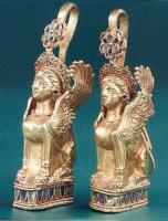 Кулоны из кургана «Три брата»